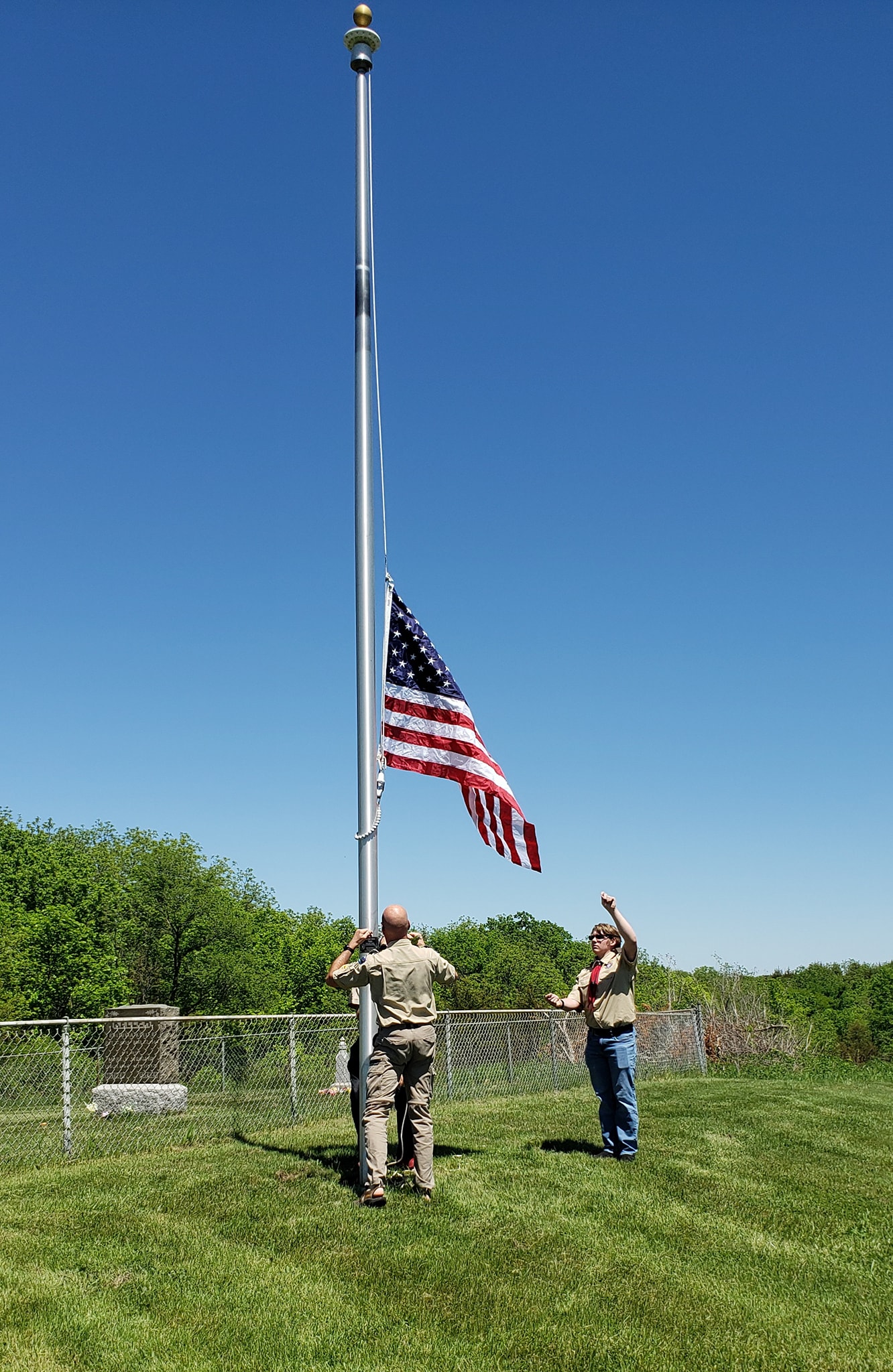 Raising the new flag at Mt Tabor Cemetery.  Photo courtesy of: Kimberly Smith